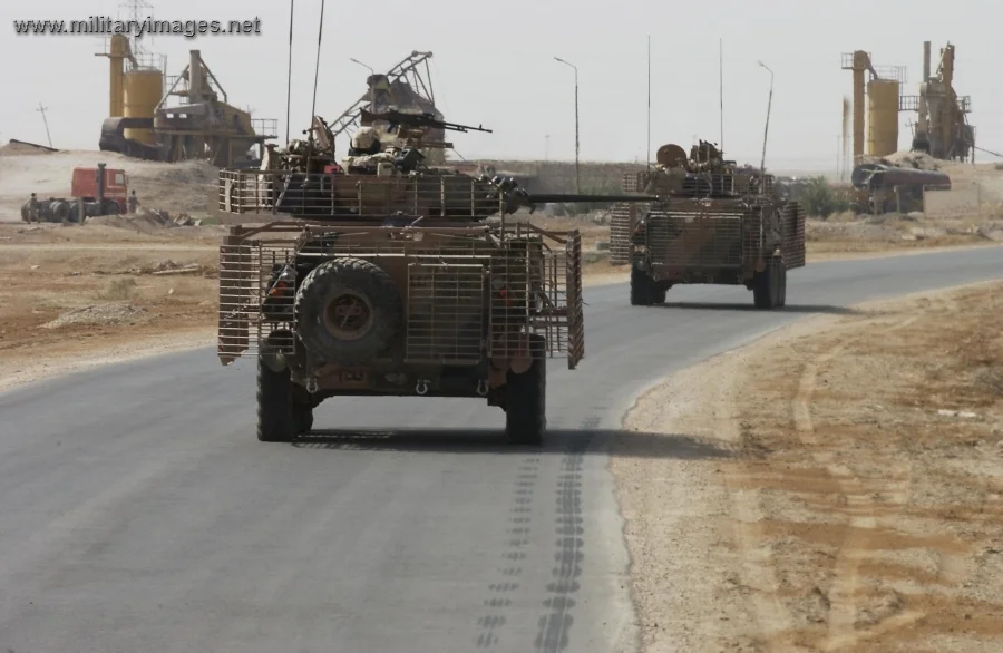 Australian Light Armoured Vehicle patrol | MilitaryImages.Net