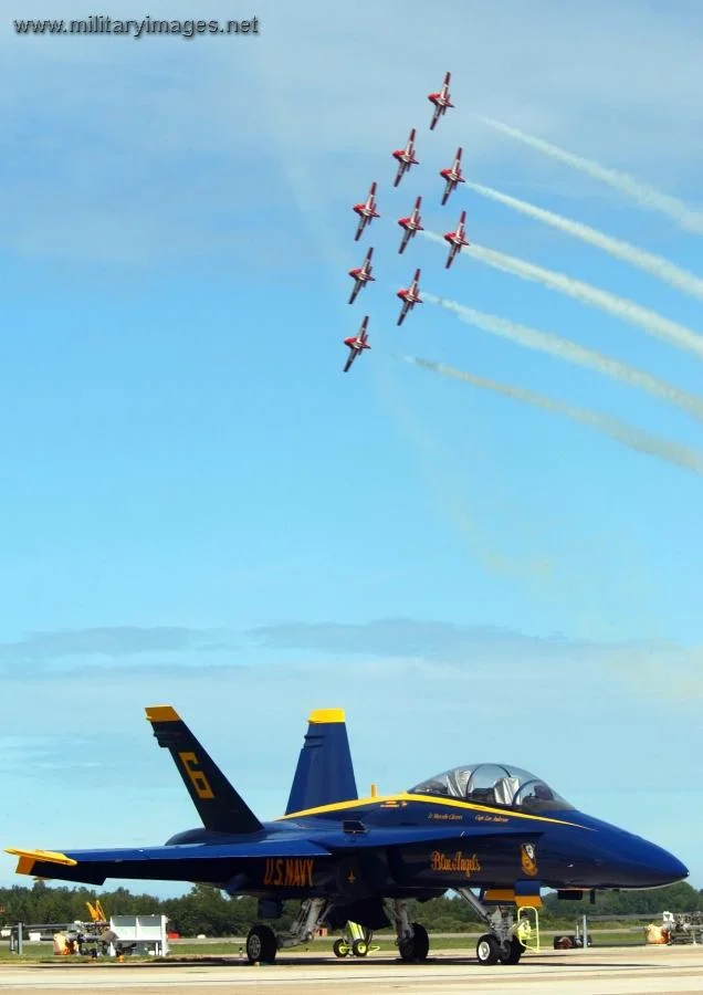 Canadian Snowbirds fly over the Blue Angels F/A-18