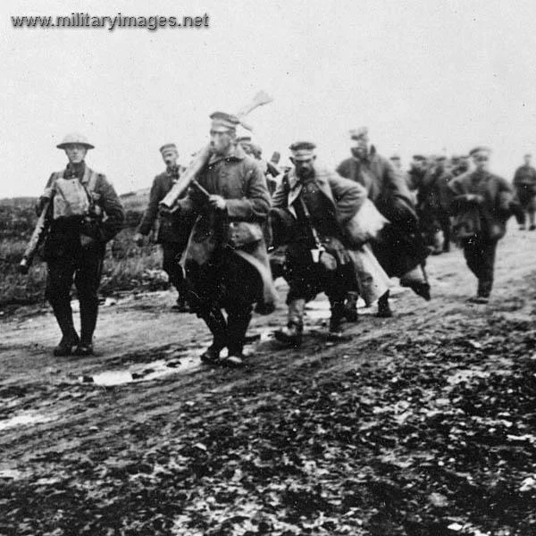 Captured German troops still carrying their machine guns | A Military ...