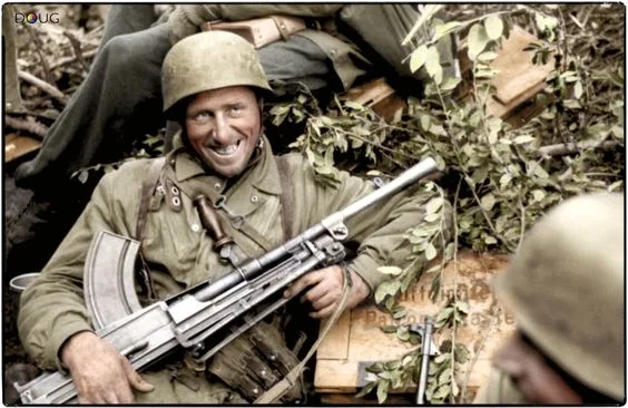 Fallschirmjäger with a captured British Bren gun in Anzio, Italy (January, 1944)