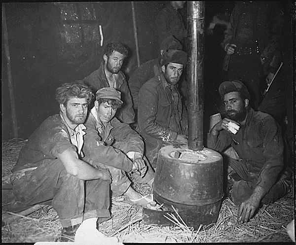 Former American And Australian Prisoners Of War Warming Up A