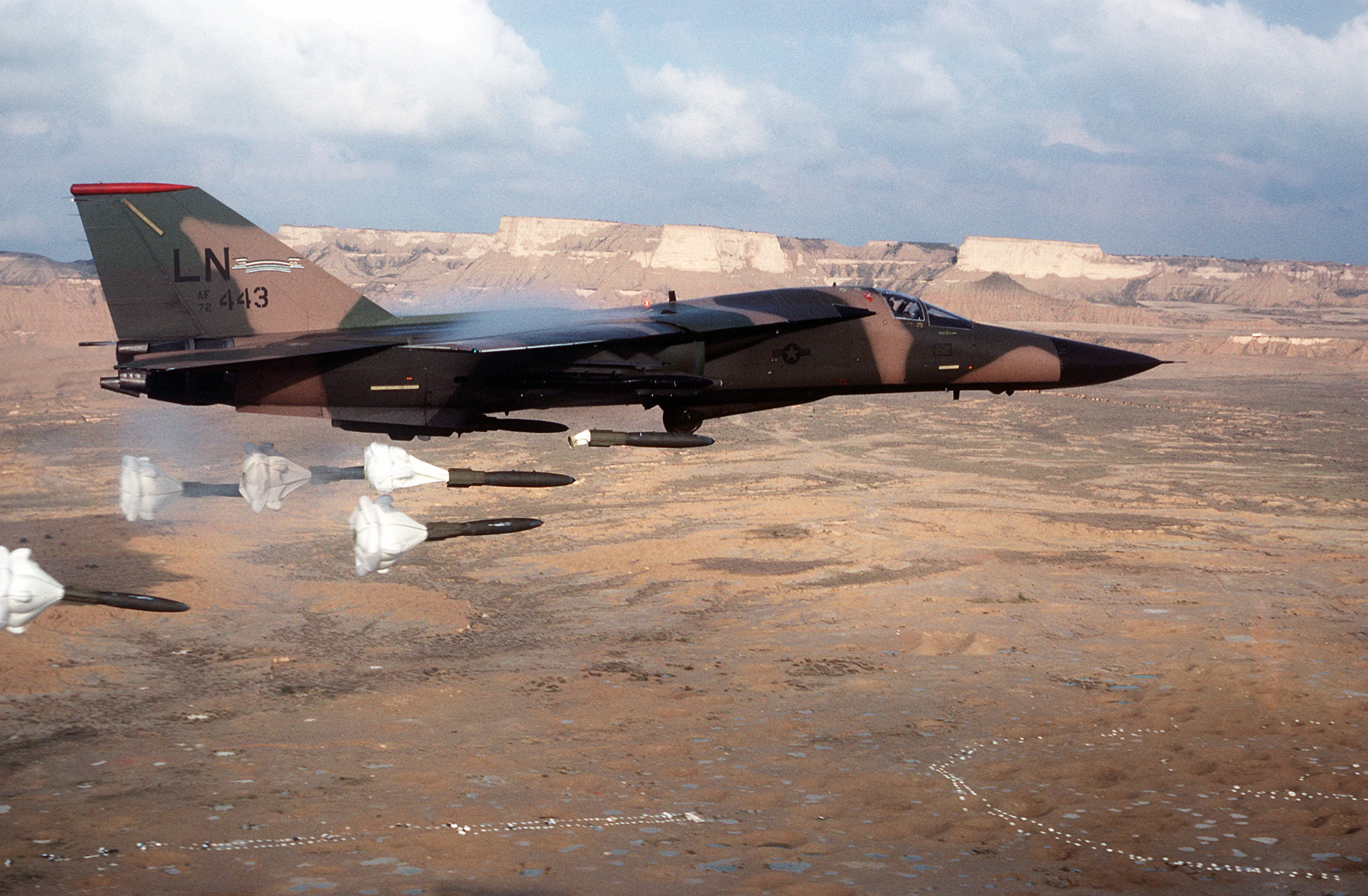 General Dynamics F-111A Aardvark releasing Mk 82 bombs