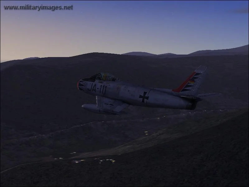 German_F-86_in_the_Morning_sky_over_Switzerland