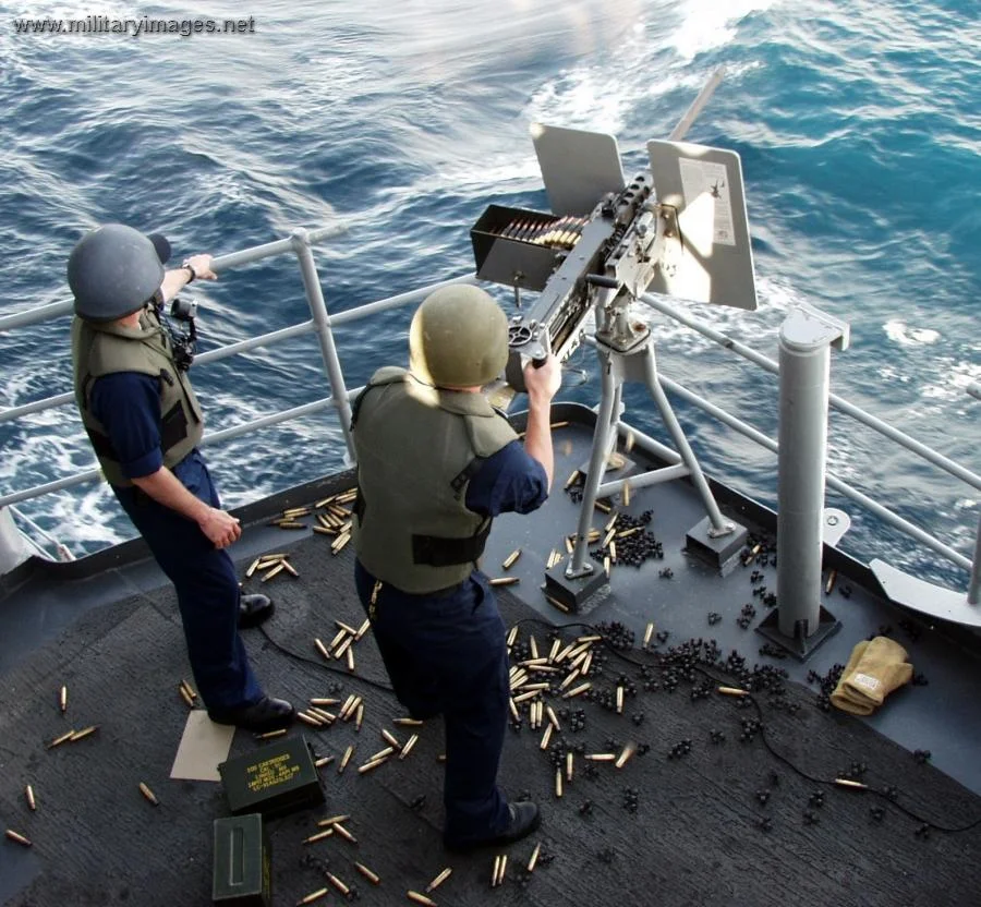 Gunner's Mates fire the .50 caliber machine gun