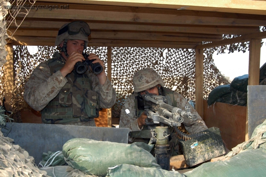 Marines stand watch at an outpost