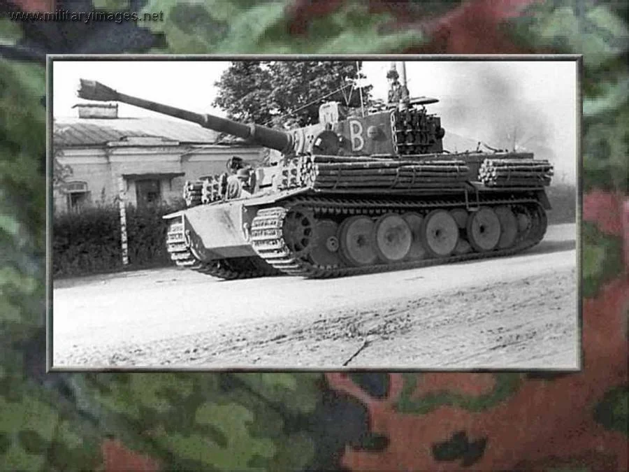 Pz6_rollin_thru_Tiger_B | A Military Photos & Video Website