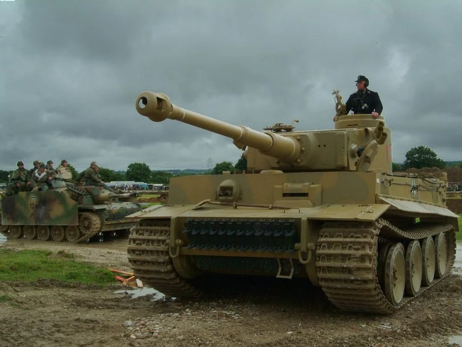 Pz6_Tiger_moves_off_field_Stug_III_3_passes | A Military Photo & Video ...