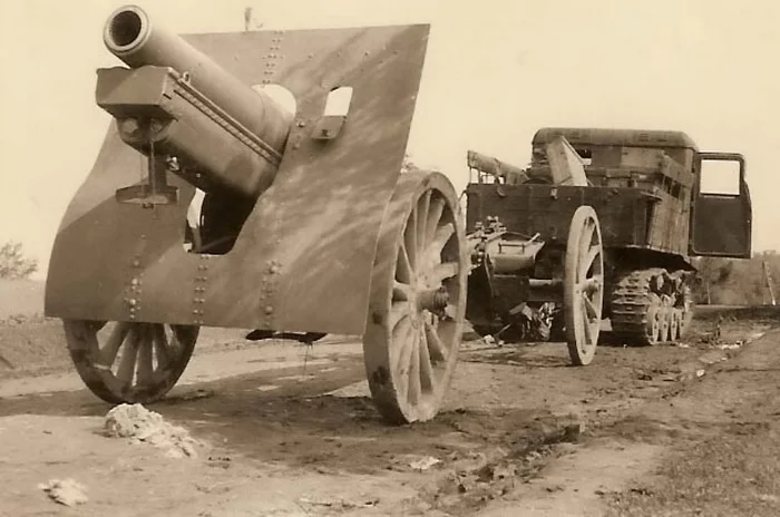 Russian Gun towed by STZ - 5 tractor