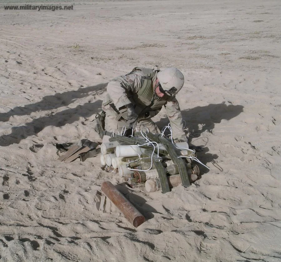 Senior Airman places C-4 explosives