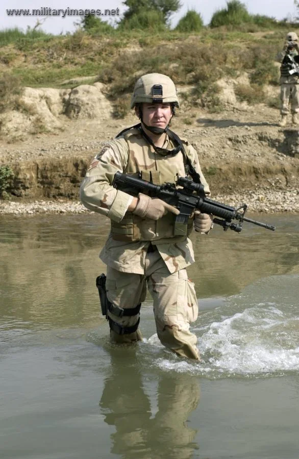 Staff Sgt. Michael Huffman crosses the Tigris River