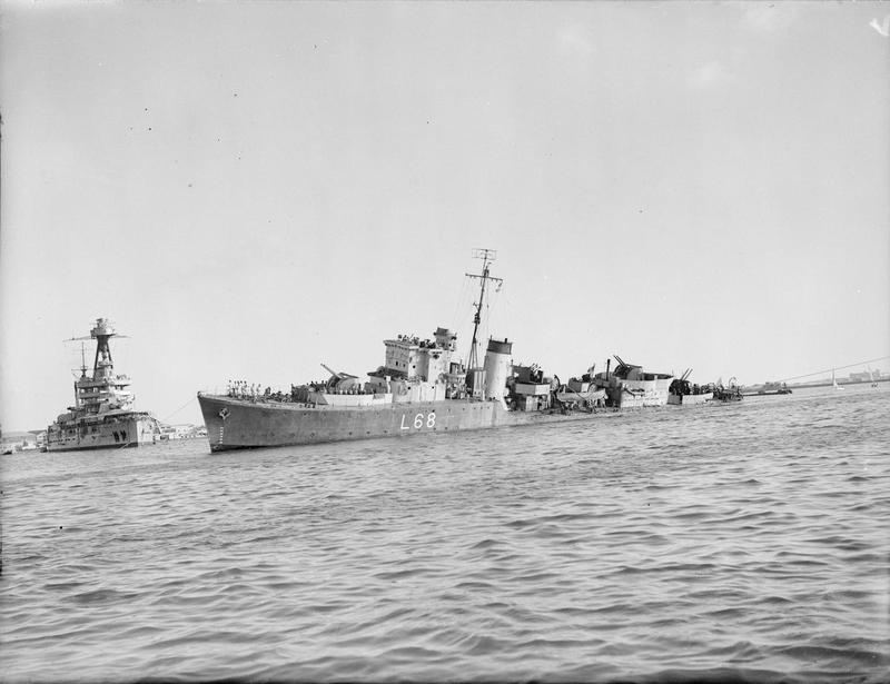 HMS_Eridge_Brought_Safely_Back_To_Harbour._29_August_1942%2C_Alexandria_Harbour._the_British_Hunt_Class_Destroyer_As_She_Was_Towed_Back_To_Harbour_After_Being_Torpedoed_by_a_German_E-boat._A13534.jpg